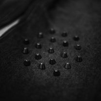 Studded Twisted Flare Jeans