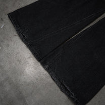 Studded Twisted Flare Jeans